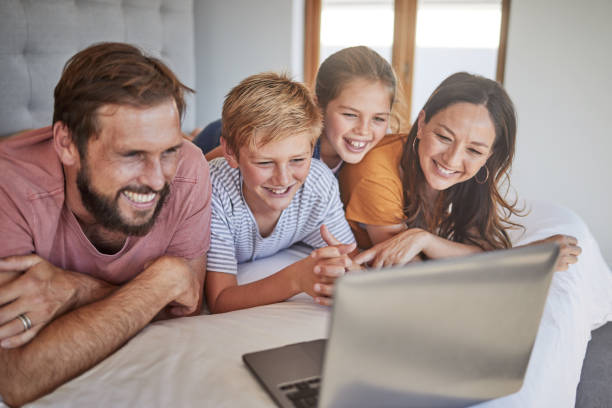 Family looking at photo memories together, representing digital legacy preservation
